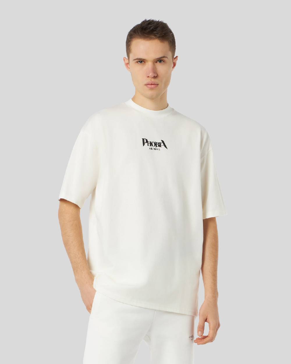 Phobia Archive T-SHIRT BIANCA CON GRAFICA BAT EYE VIOLA Convenienza