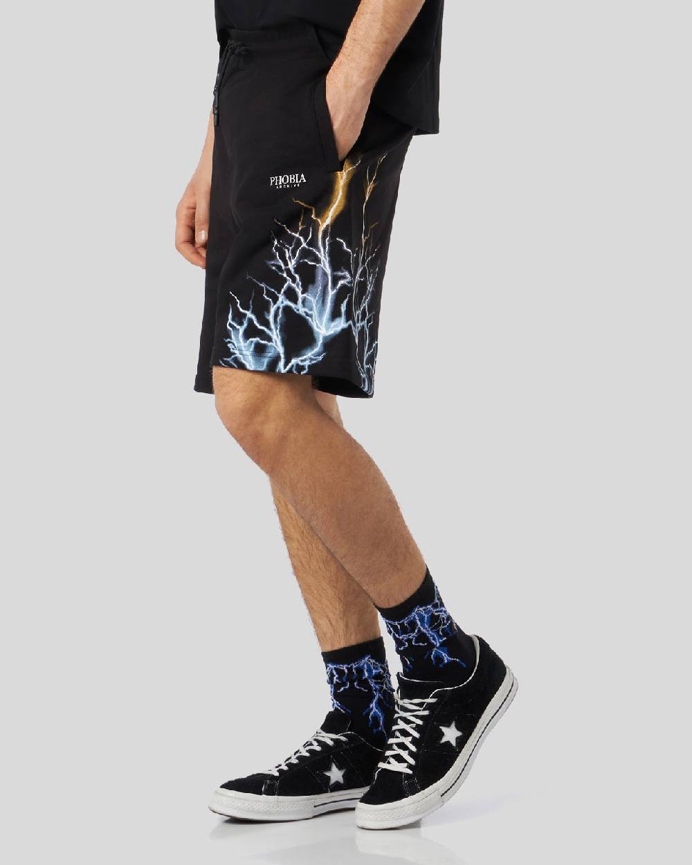 Phobia Archive PANTALONCINO NERO CON STAMPA FULMINE BICOLORE GIALLO E BLU Pezzi Unici