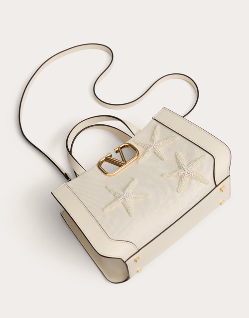 Red Valentino BORSA PICCOLA A MANO VALENTINO GARAVANI ESCAPE IN RAFIA CON RICAMO 2025